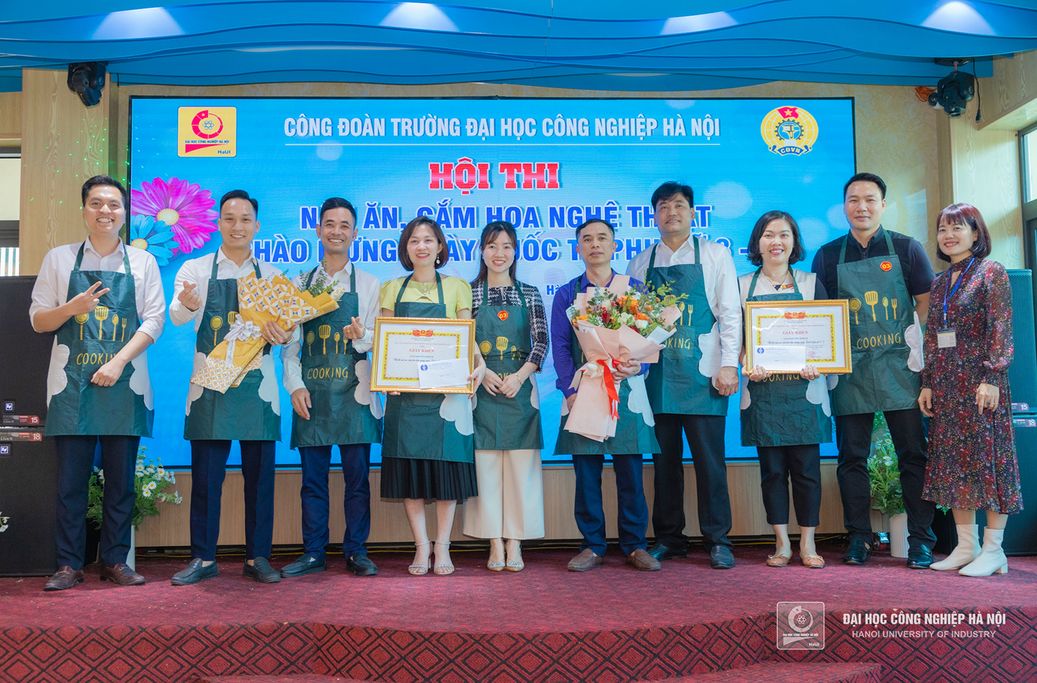 Liên quân Trung tâm Việt Nhật - Khoa Điện - Phòng công tác sv - Trạm y tế - Khoa GDTC - GDQP giành giải Khuyến khích cuộc thi nấu ăn, cắm hoa kỷ niệm ngày quốc tế phụ nữ 8/3